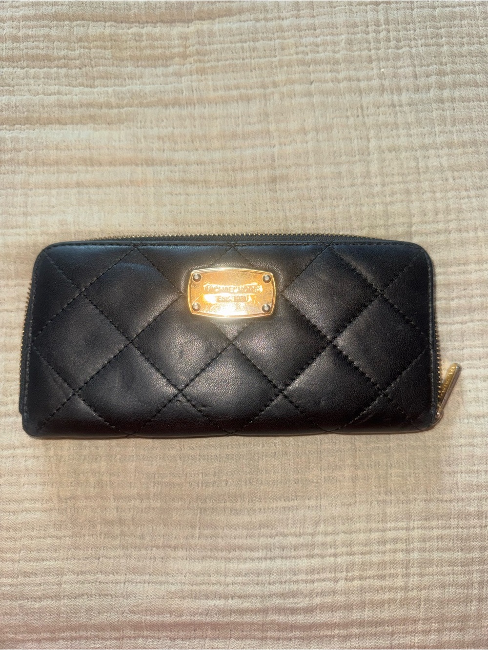 Michael Kors Black Quilted Leather Zip-Around Wallet with Gold Plate